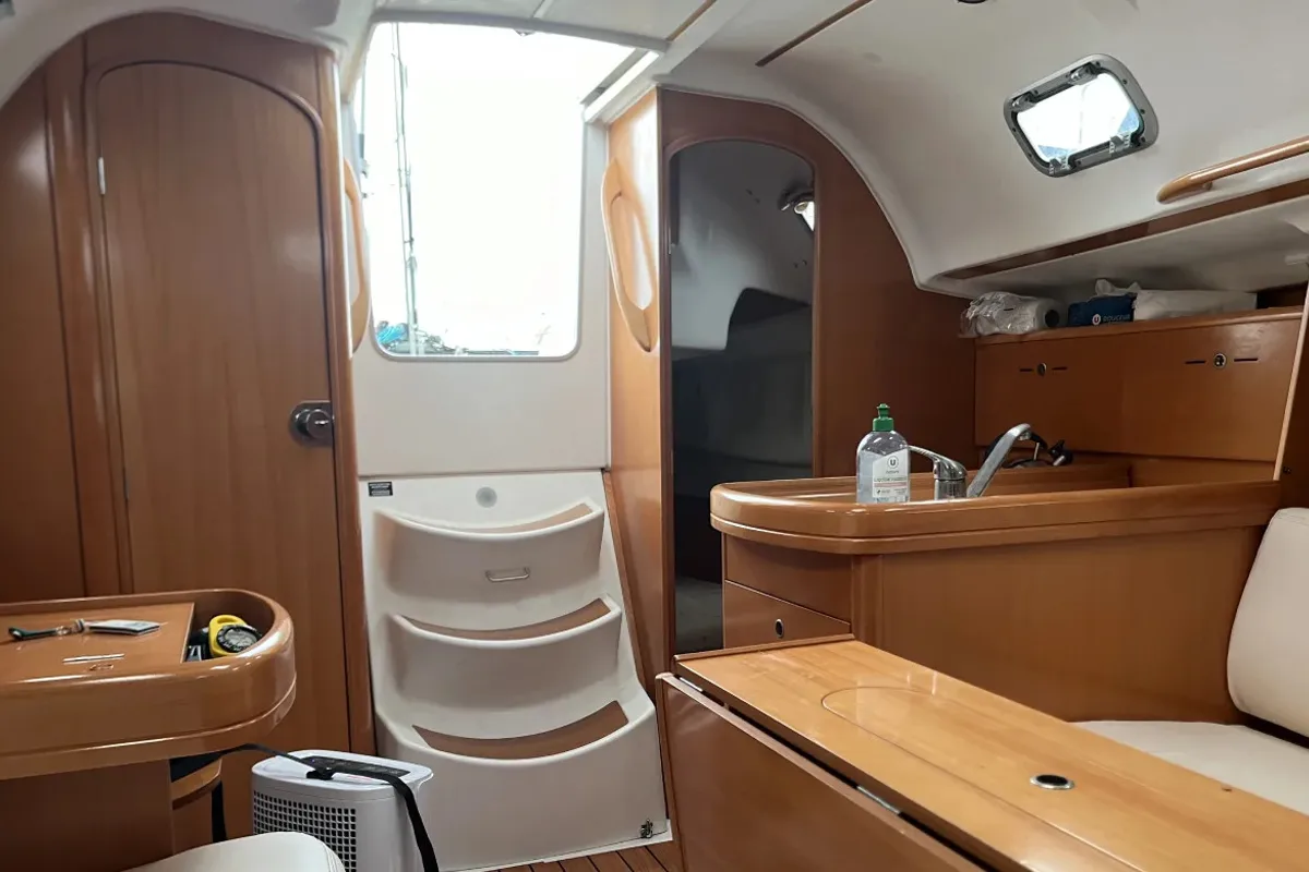 Salon of Tiaga, a Beneteau First 31.7 sailboat at Saint-Cast-le-Guildo, France