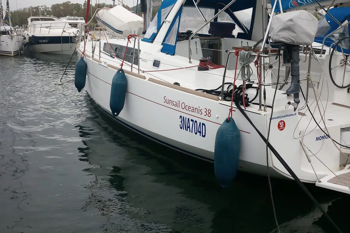 Exterior view of Monica, a Beneteau Oceanis 38 sailboat at Cannigione, Italy