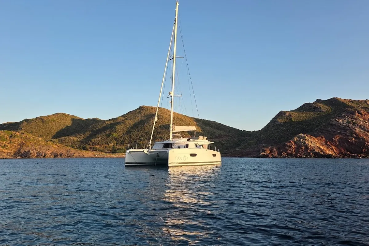 Exterior view of Fugu II, a Fountaine Pajot Elba 45 catamaran at Municipal Unit of Rhodes, Greece
