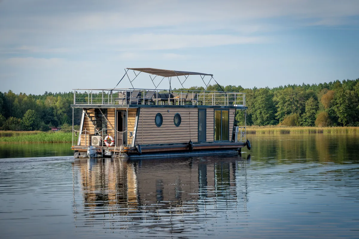 Exterior view of Miami, a Woma D13 motorboat at Fürstenberg/Havel, Germany