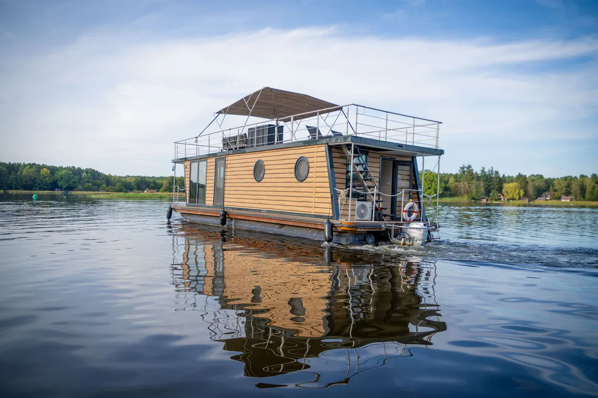 Exterior view of Miami, a Woma D13 motorboat at Fürstenberg/Havel, Germany
