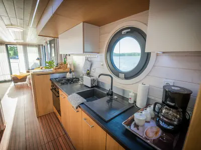 Galley of Miami, a Woma D13 motorboat at Fürstenberg/Havel, Germany