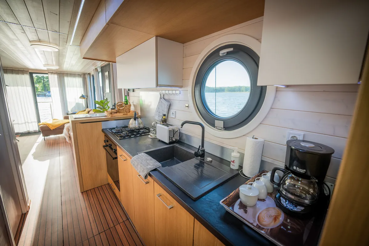 Galley of Miami, a Woma D13 motorboat at Fürstenberg/Havel, Germany