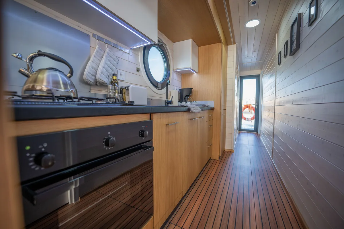 Galley of Miami, a Woma D13 motorboat at Fürstenberg/Havel, Germany