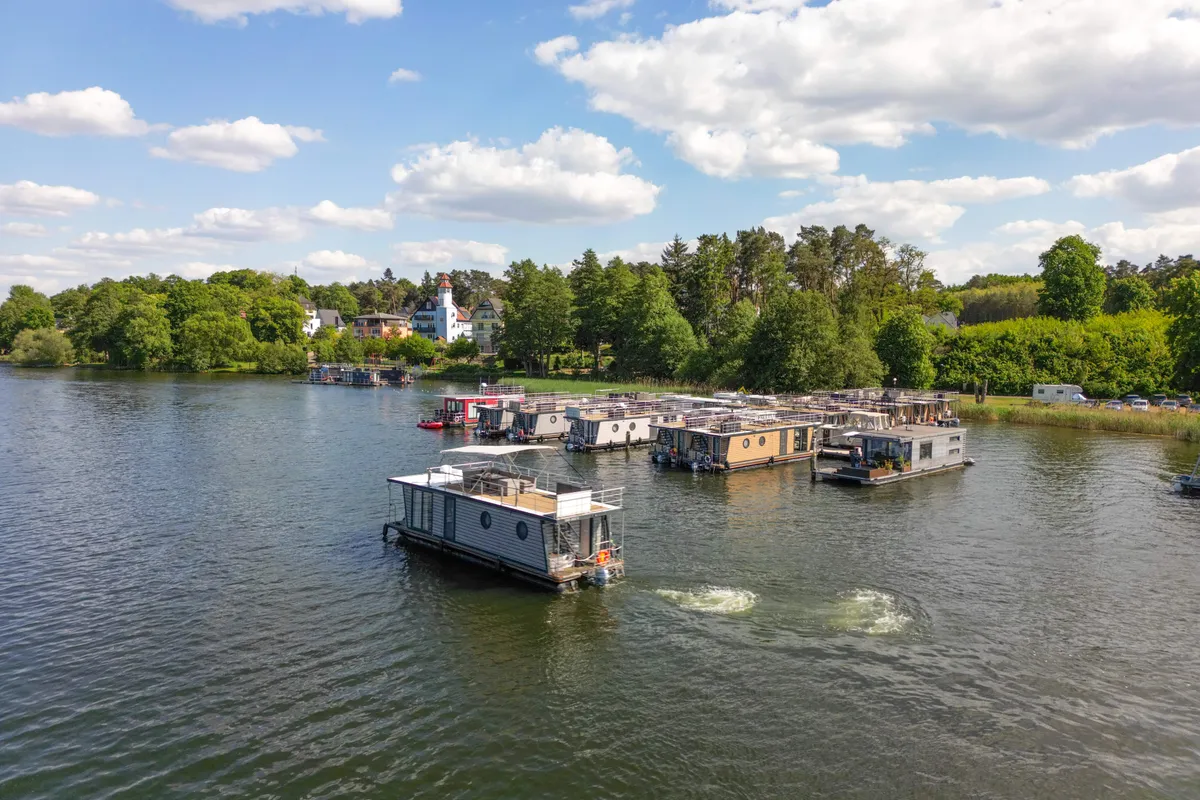 Exterior view of Miami, a Woma D13 motorboat at Fürstenberg/Havel, Germany