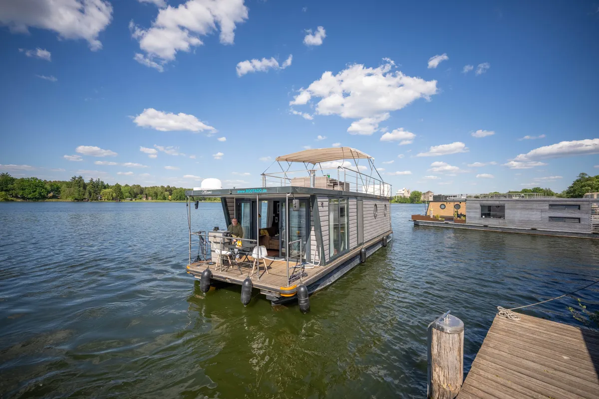 Exterior view of Miami, a Woma D13 motorboat at Fürstenberg/Havel, Germany