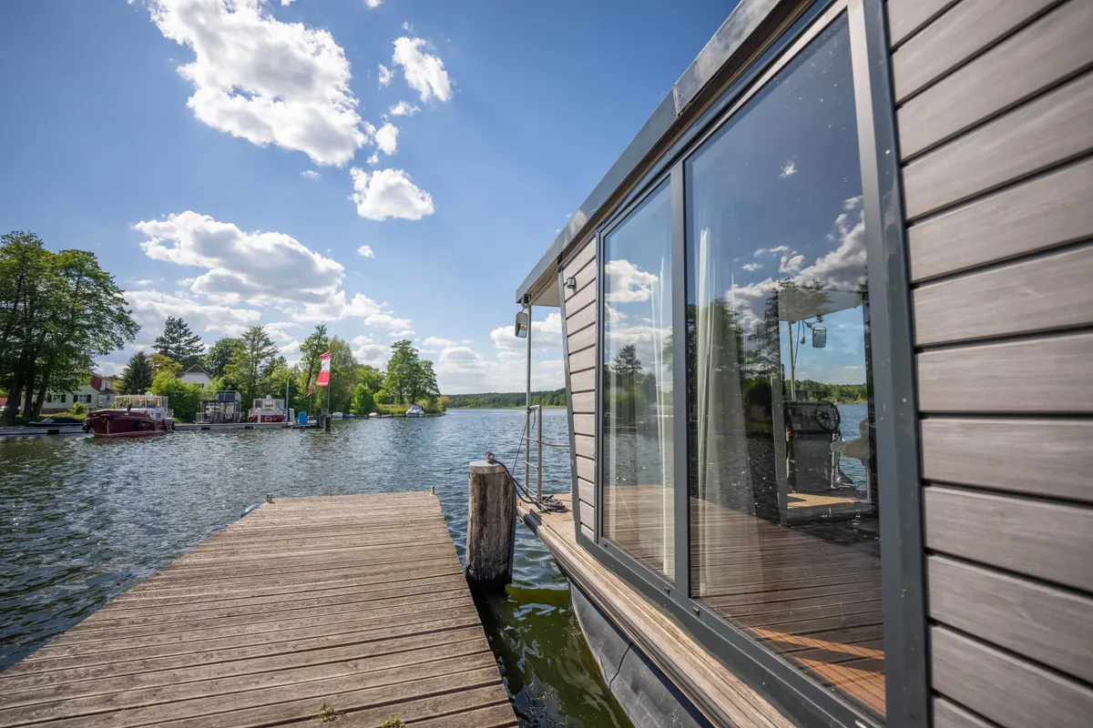 Exterior view of Miami, a Woma D13 motorboat at Fürstenberg/Havel, Germany
