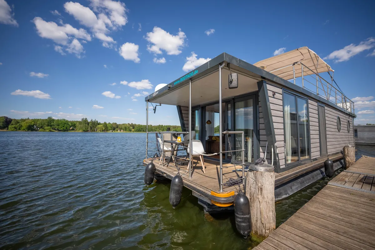 Exterior view of Miami, a Woma D13 motorboat at Fürstenberg/Havel, Germany