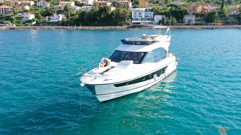Exterior view of Nora, a Beneteau Monte Carlo 52 motorboat at Seget Donji, Croatia