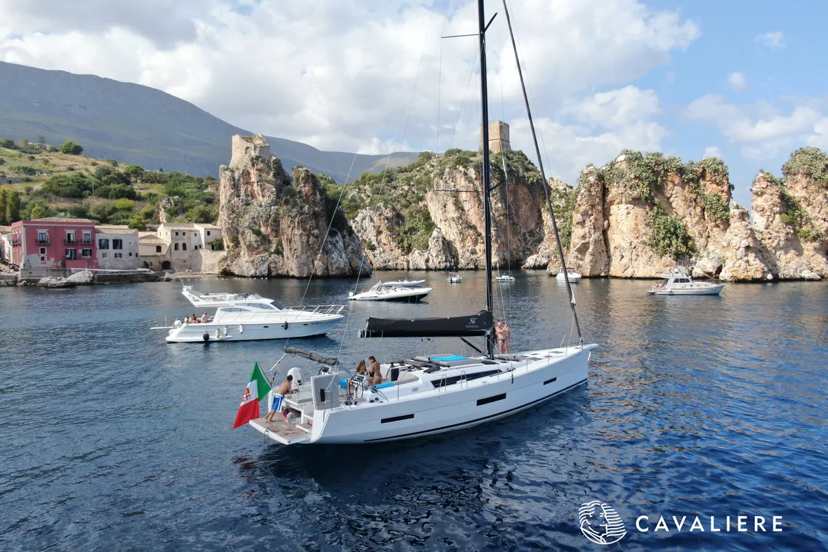 Exterior view of Premium, a Dufour 56 Exclusive sailboat at Castellammare del Golfo, Italy