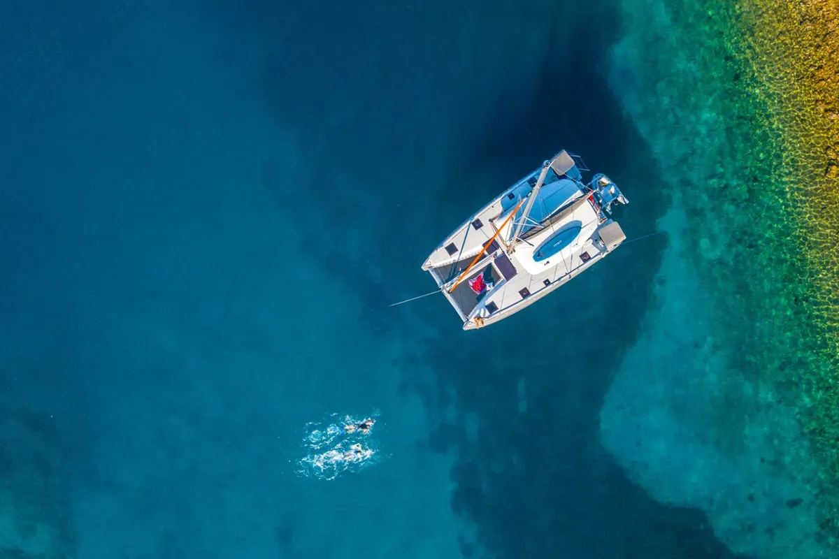 Exterior view of Lizzy, a Excess 11 - 4 + 1 + 1 cab. catamaran at Fethiye, Turkey