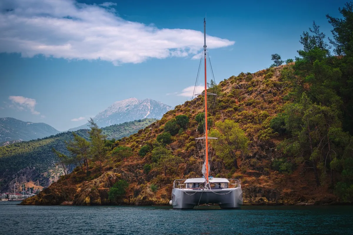 Exterior view of Lizzy, a Excess 11 - 4 + 1 + 1 cab. catamaran at Fethiye, Turkey