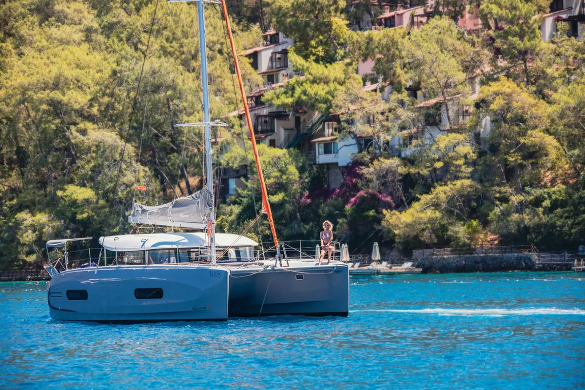 Exterior view of Lizzy, a Excess 11 - 4 + 1 + 1 cab. catamaran at Fethiye, Turkey