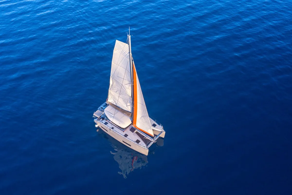 Exterior view of Lizzy, a Excess 11 - 4 + 1 + 1 cab. catamaran at Fethiye, Turkey