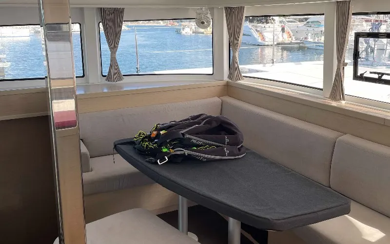 Salon of Aventura, a Lagoon 42 OW catamaran at Ventimiglia, Italy