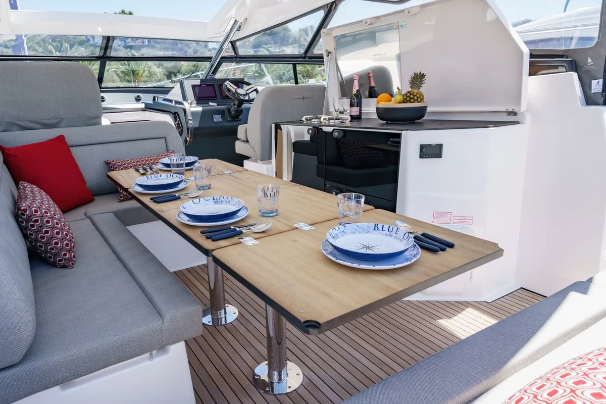 Deck of Ostwind, a Bavaria SR36 Open Top motor yacht at Cala Egos, Spain