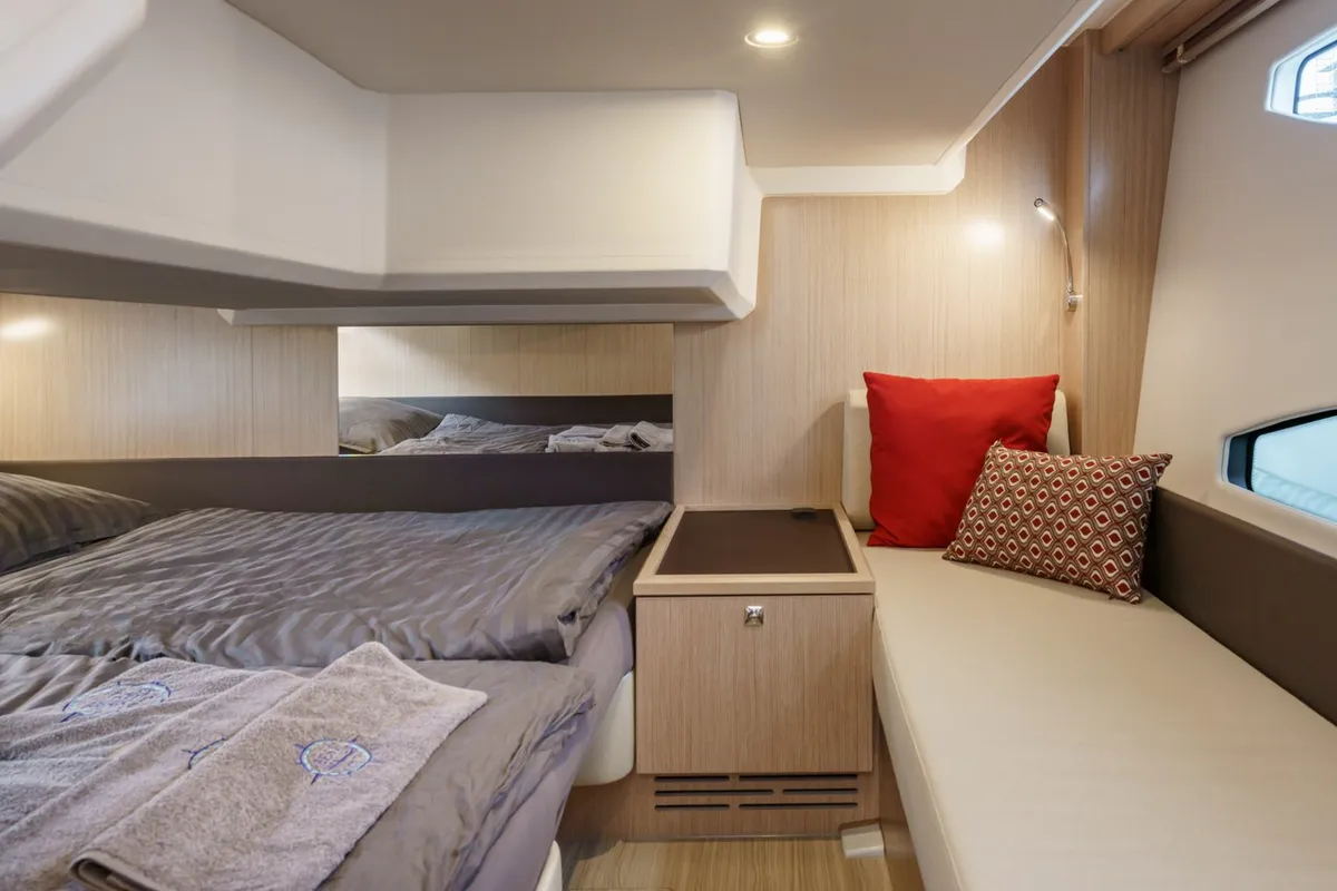 Cabin on Ostwind, a Bavaria SR36 Open Top motor yacht at Cala Egos, Spain