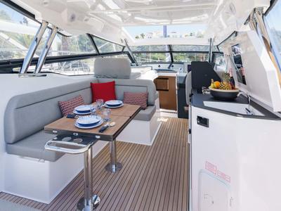 Deck of Ostwind, a Bavaria SR36 Open Top motor yacht at Cala Egos, Spain