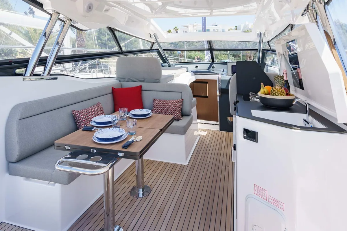 Deck of Ostwind, a Bavaria SR36 Open Top motor yacht at Cala Egos, Spain