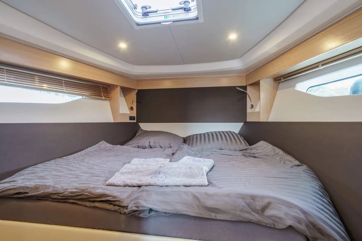 Cabin on Ostwind, a Bavaria SR36 Open Top motor yacht at Cala Egos, Spain