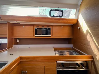 Galley of Gavi, a Dufour 412 Grand large sailboat at Olbia, Italy