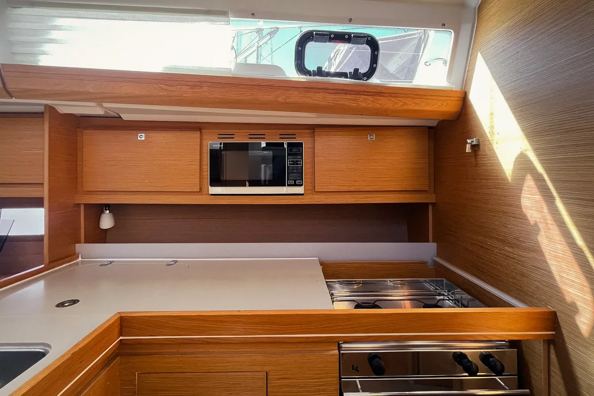 Galley of Gavi, a Dufour 412 Grand large sailboat at Olbia, Italy