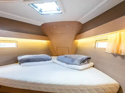 Cabin on Gavi, a Dufour 412 Grand large sailboat at Olbia, Italy