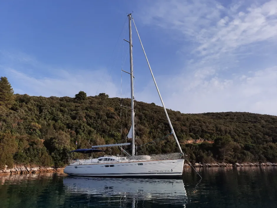 Exterior view of Vika, a Jeanneau Sun Odyssey 54 DS sailboat at Pirovac, Croatia