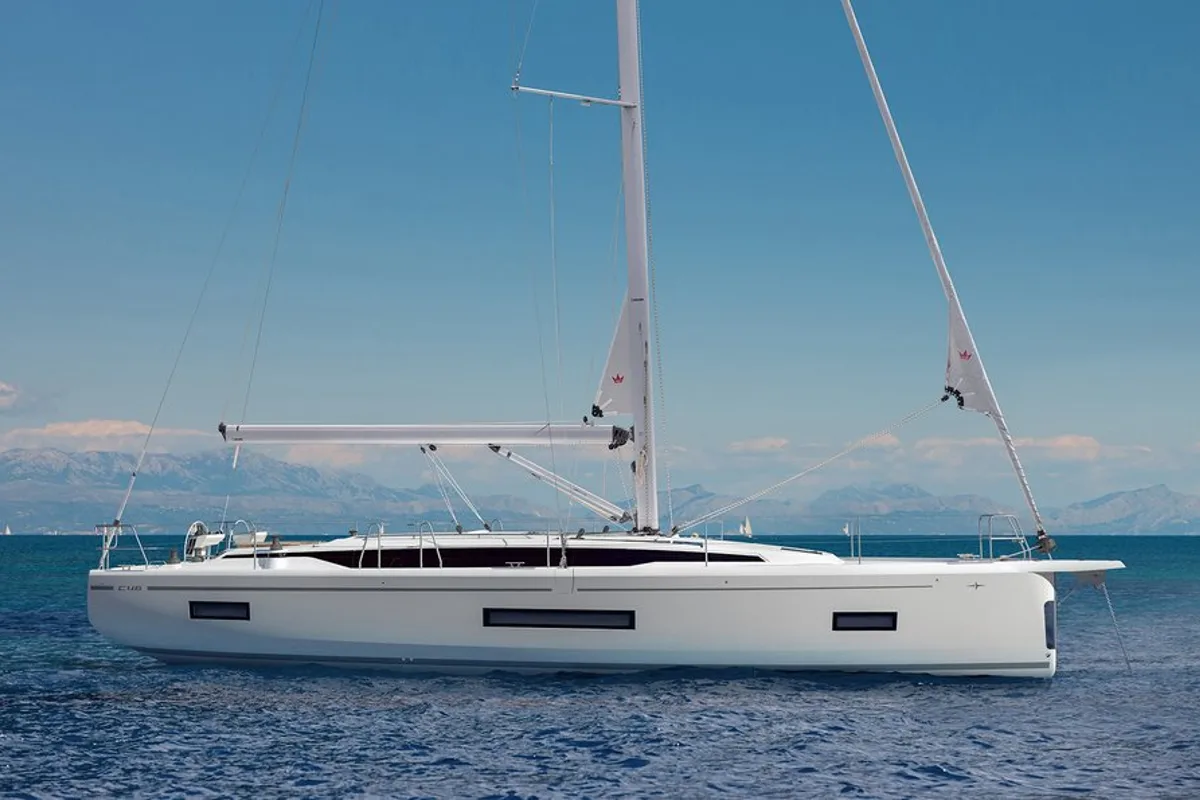 Exterior view of Ostwind III, a Bavaria C46 sailboat at Cala Egos, Spain