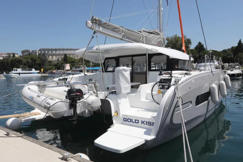Exterior view of Gold Kiss, a Excess 11 - 4 + 1 + 1 cab. catamaran at Split, Croatia