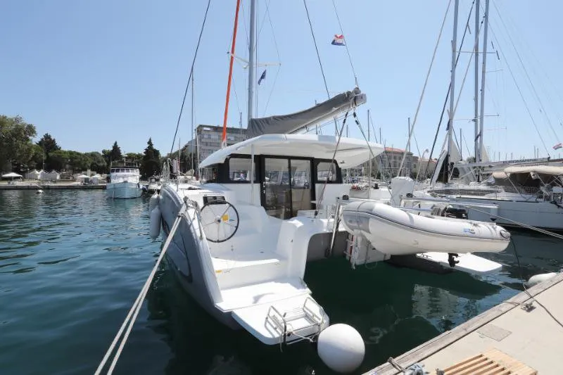 Exterior view of Gold Kiss, a Excess 11 - 4 + 1 + 1 cab. catamaran at Split, Croatia