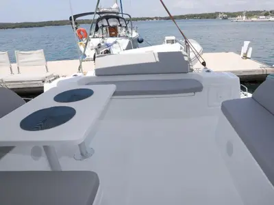 Deck of Gold Kiss, a Excess 11 - 4 + 1 + 1 cab. catamaran at Split, Croatia
