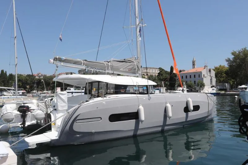Exterior view of Gold Kiss, a Excess 11 - 4 + 1 + 1 cab. catamaran at Split, Croatia