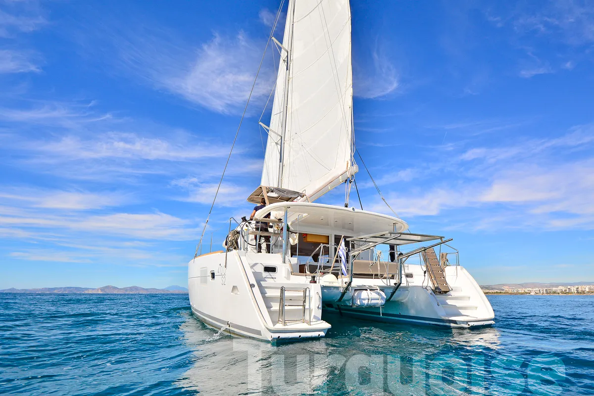Exterior view of Turquoise, a Lagoon 400 S2 catamaran at Lavreotiki Municipal Unit, Greece