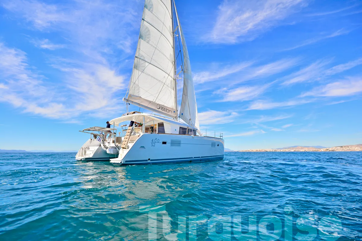 Exterior view of Turquoise, a Lagoon 400 S2 catamaran at Lavreotiki Municipal Unit, Greece