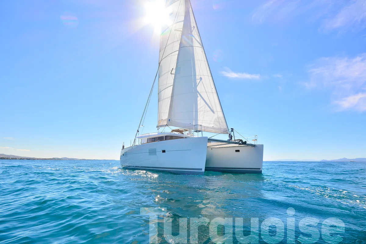 Exterior view of Turquoise, a Lagoon 400 S2 catamaran at Lavreotiki Municipal Unit, Greece