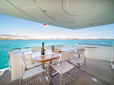 Deck of SIMPLY BRILLIANT, a Ferretti 68 motor yacht at Ornos, Greece