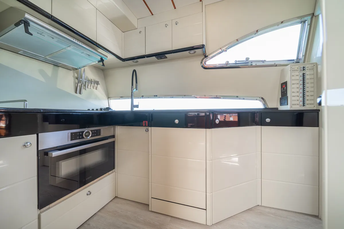 Galley of SIMPLY BRILLIANT, a Ferretti 68 motor yacht at Ornos, Greece