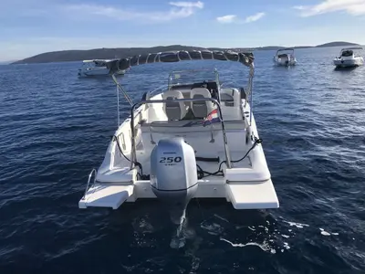 Beneath Flyer 7.7 Space Deck, a Beneteau Flyer 7.7 Space Deck motorboat at Grad Trogir, Croatia