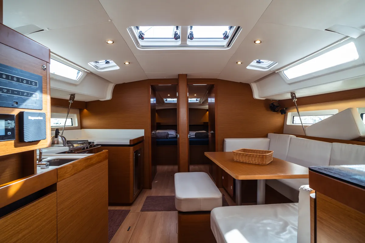Salon of Aurora, a Jeanneau Sun Odyssey 490 sailboat at Olbia, Italy