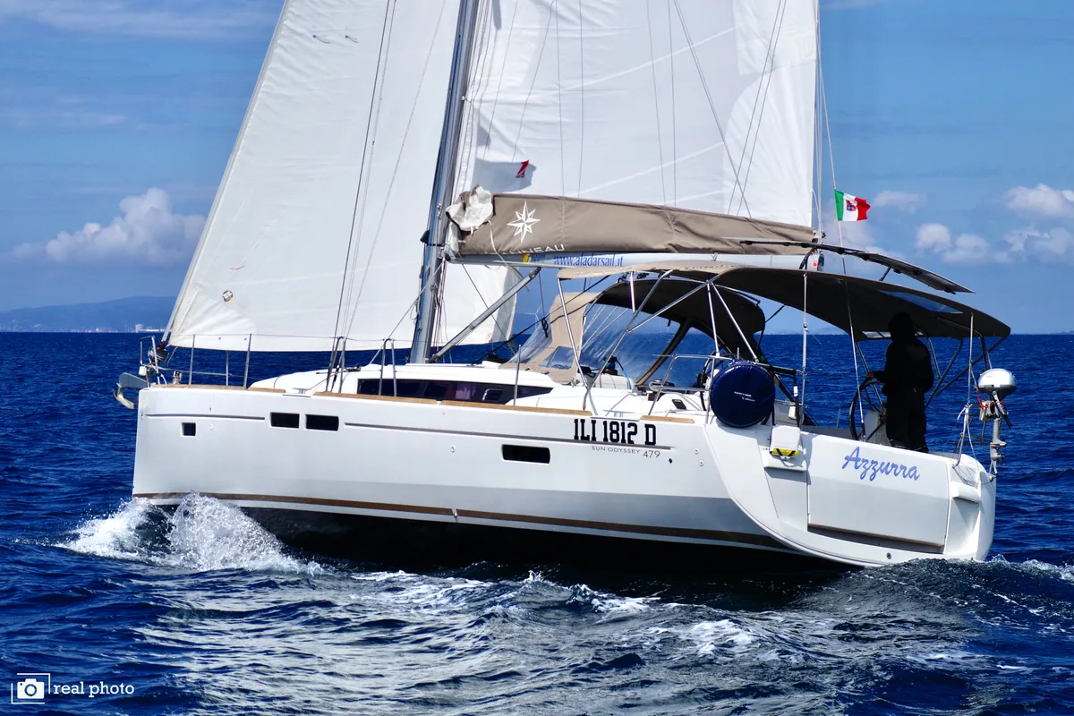 Exterior view of Azzurra, a Jeanneau Sun Odyssey 479 sailboat at Puntone di Scarlino, Italy