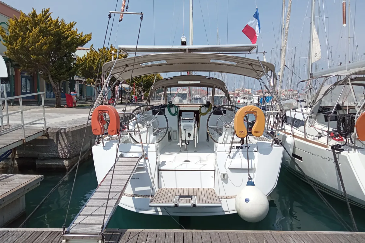 Exterior view of Eternity, a Jeanneau Sun Odyssey 409 sailboat at Lefkada, Greece