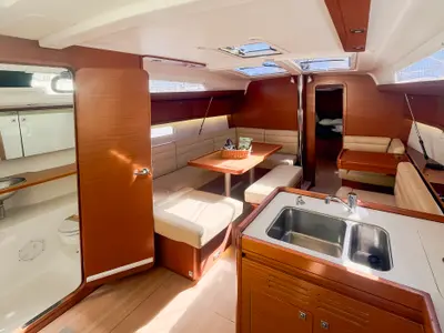 Salon of Domi, a Dufour 412 Grand large sailboat at Olbia, Italy