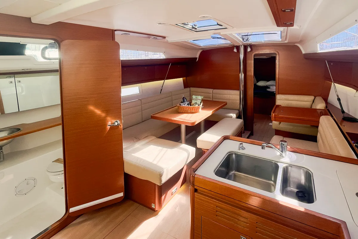 Salon of Domi, a Dufour 412 Grand large sailboat at Olbia, Italy