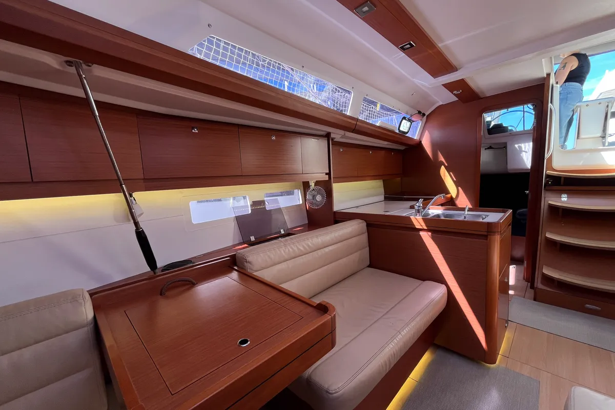 Salon of Domi, a Dufour 412 Grand large sailboat at Olbia, Italy