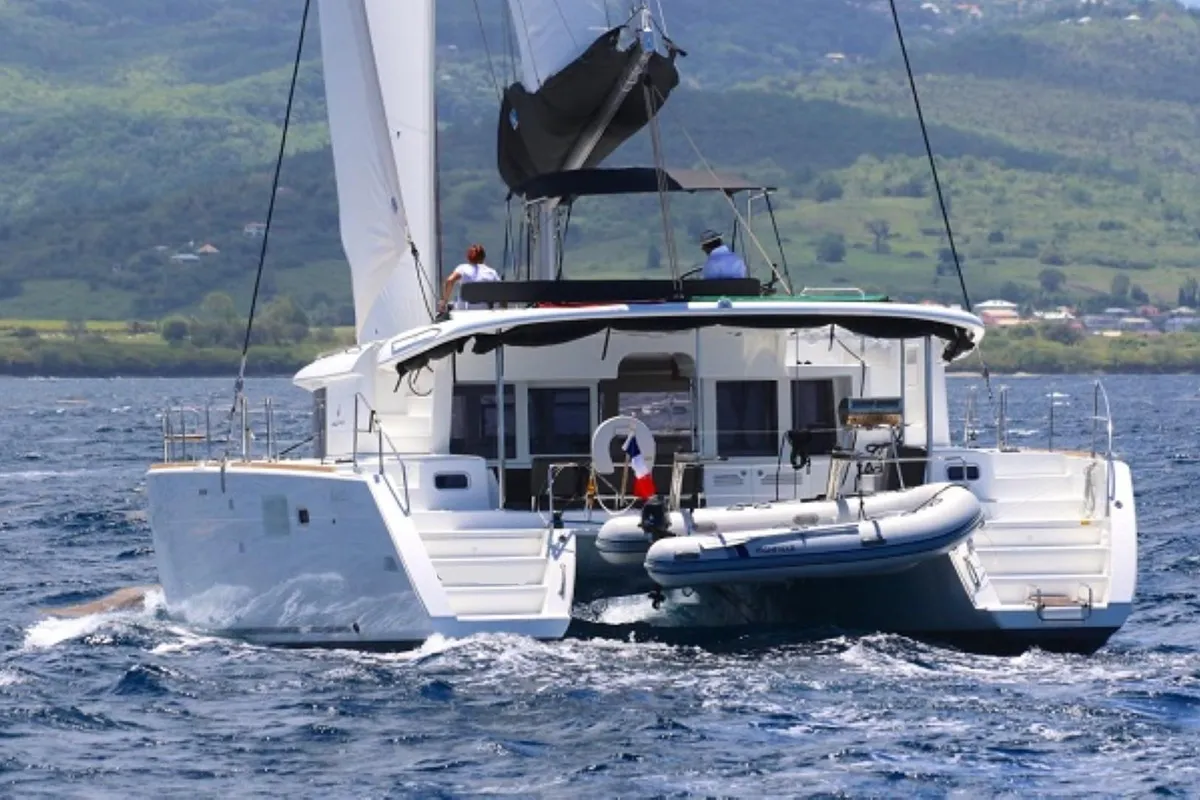 Exterior view of Oneno, a Lagoon 450 Fly catamaran at Sant Antoni de Portmany, Spain