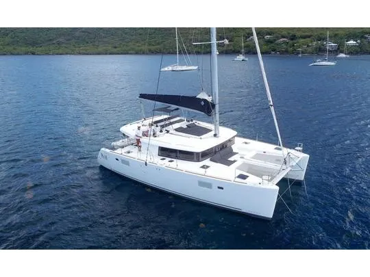 Exterior view of Oneno, a Lagoon 450 Fly catamaran at Sant Antoni de Portmany, Spain