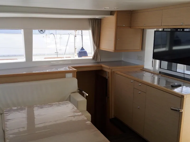 Salon of Dioni, a Lagoon 450 Fly catamaran at Athens, Greece