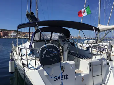 Exterior view of Sabik, a Beneteau Oceanis 393 sailboat at U Pàize, Italy