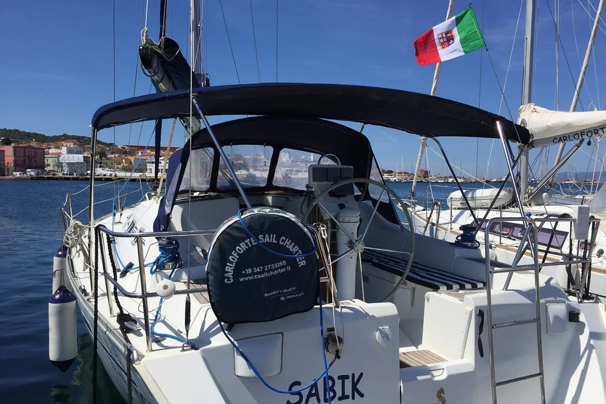 Exterior view of Sabik, a Beneteau Oceanis 393 sailboat at U Pàize, Italy